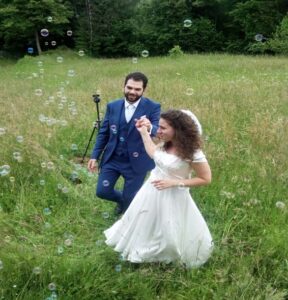 Custom-tailored wedding dress and groom's suit in Cambridge by Cambridge Tailoring.