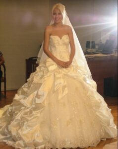 Stunning bride in a custom wedding dress designed by Cambridge Tailoring in Cambridge.